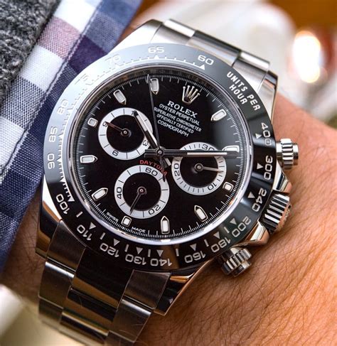 rolex cosmograph daytona black dial winner dsytona 1992 replica|Rolex daytona counterfeit logo.